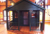 Display of a small cabin in the Old Quaker Store Museum