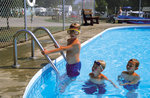 Boys swimming in the Pool at Triple R Campground